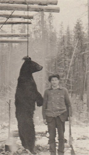 Forrest Carpenter with bear.jpg